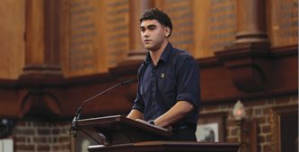2026 Head Prefect Nico Stanley addressing the student body