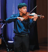 Form 5 student Hayden Chiu on violin