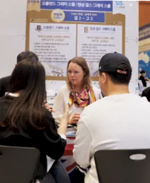 Rachel Fenton at an SiS education fair in Korea